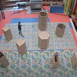 Urban Air Mobility Guidance with Panel Method: Experimental Evaluation Under Wind Disturbances